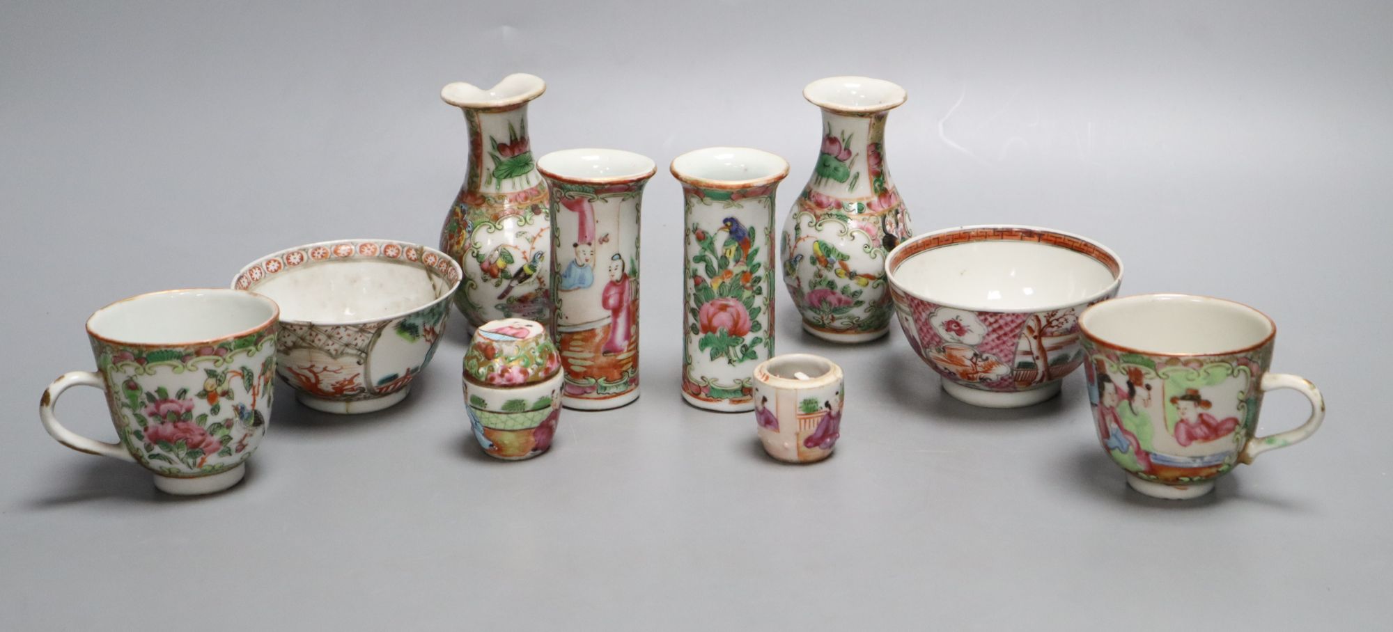 A group of Chinese famille rose tea wares and miniature vases, 19th century, tallest 9.5cm, damage